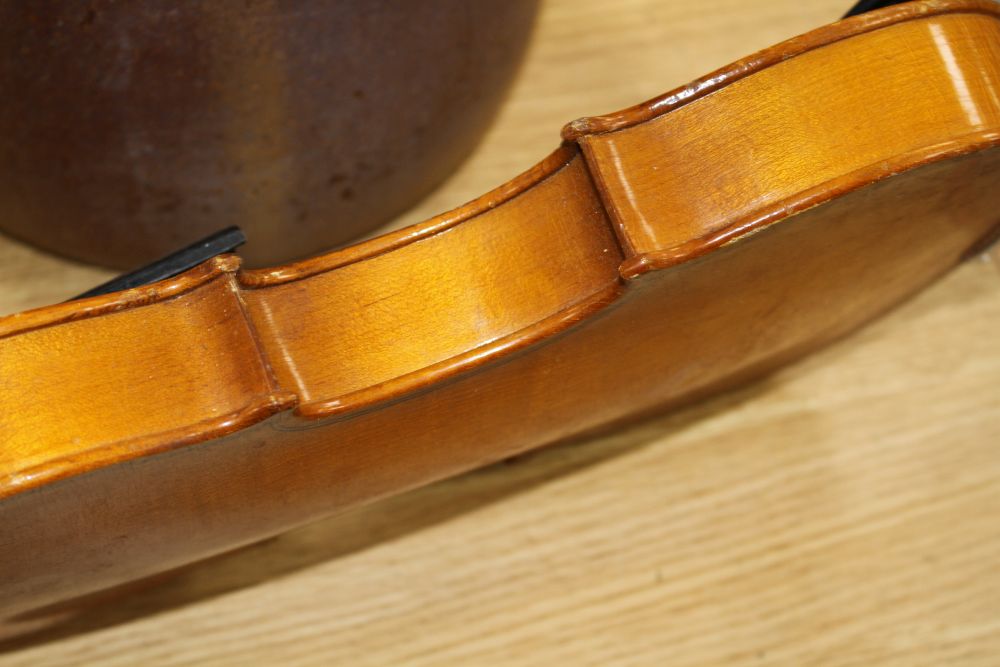 A Chinese violin and four bows